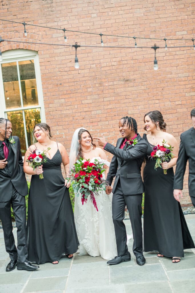 red-black-winter-wedding-black-wedding-attire-groom-bridesmaids-downtown-houston-heights-houston-station-3-wedding-venue-AVP-ashleys-visions-productions-houston-wedding-planner