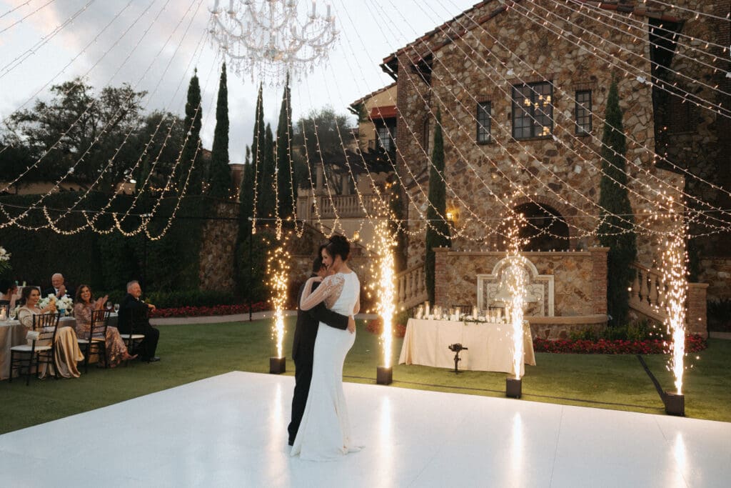 winter-wedding-florida-bella-collina-resort-wedding-venue-first-dance-cold-sparks-light-tent-outdoor-wedding-reception-AVP-ashleys-visions-productions-houston-wedding-planner-destination-wedding-planner 