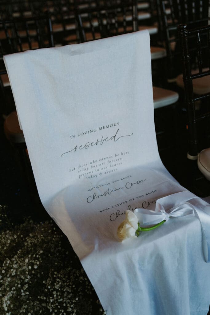 modern-astorian-wedding-ceremony-in-memory-chair-linen-signage
