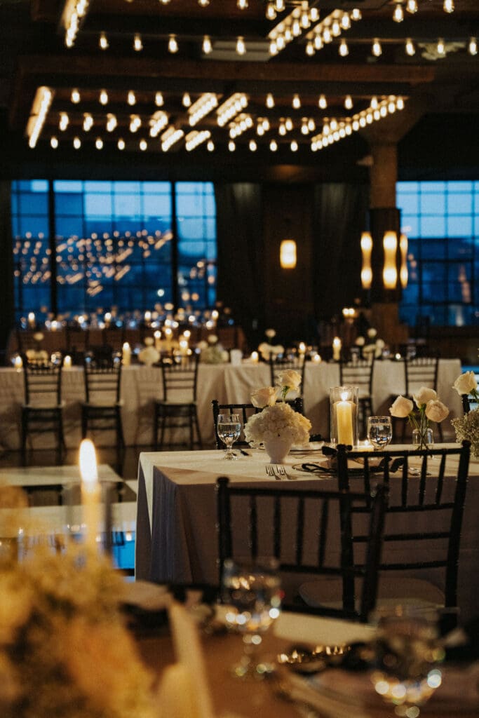 modern-astorian-wedding-custom-rose-floral-centerpieces-black-and-white-dancefloor