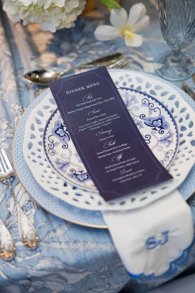 Blue-white-wedding-china-place-settings-blue-white-monogram-napkin-blue-menu-wedding-four-seasons