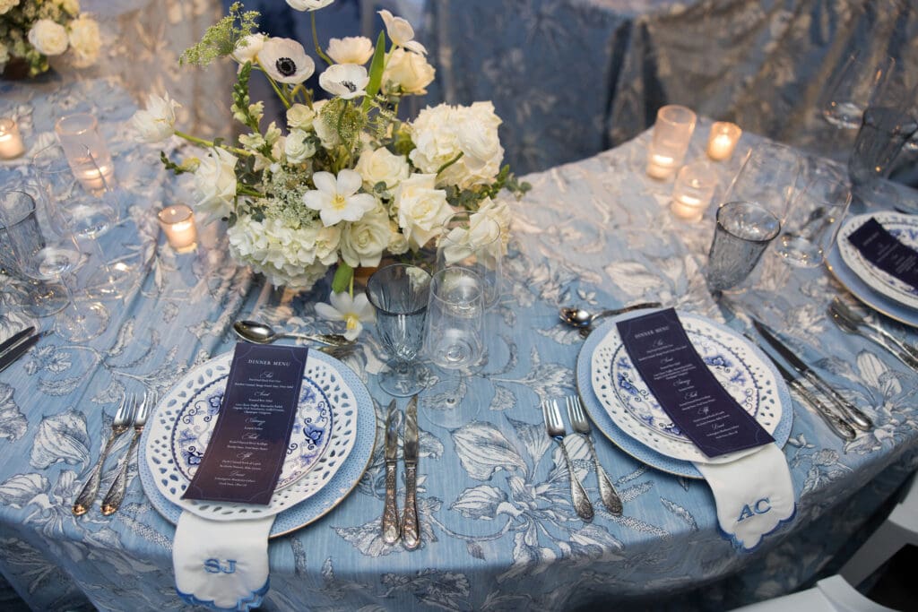 blue-white-wedding-china-blue-menus-monogram-napkins-blue-floral-linen-wedding-white-floral-centerpieces