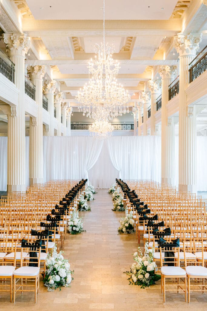 Corinthian-Houston-black-white-wedding-ceremony-draping-white-green-florals