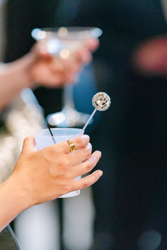 corinthian-houston-wedding-disco-ball-drink-stir