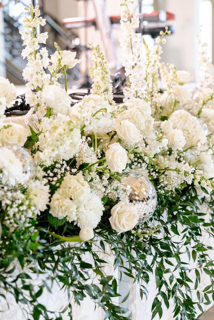 Corinthian-Houston-black-white-wedding-disco-balls-in floral-centerpieces-band-florals