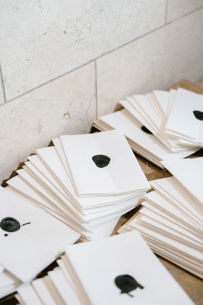 Corinthian-Houston-black-white-wedding-custom-programs-and-seating-chart 