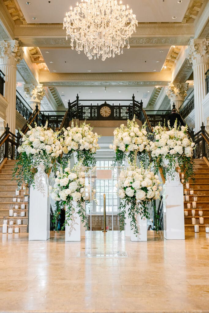 Corinthian-Houston-black-white-wedding-ceremony-florals-white-and-green-centerpieces